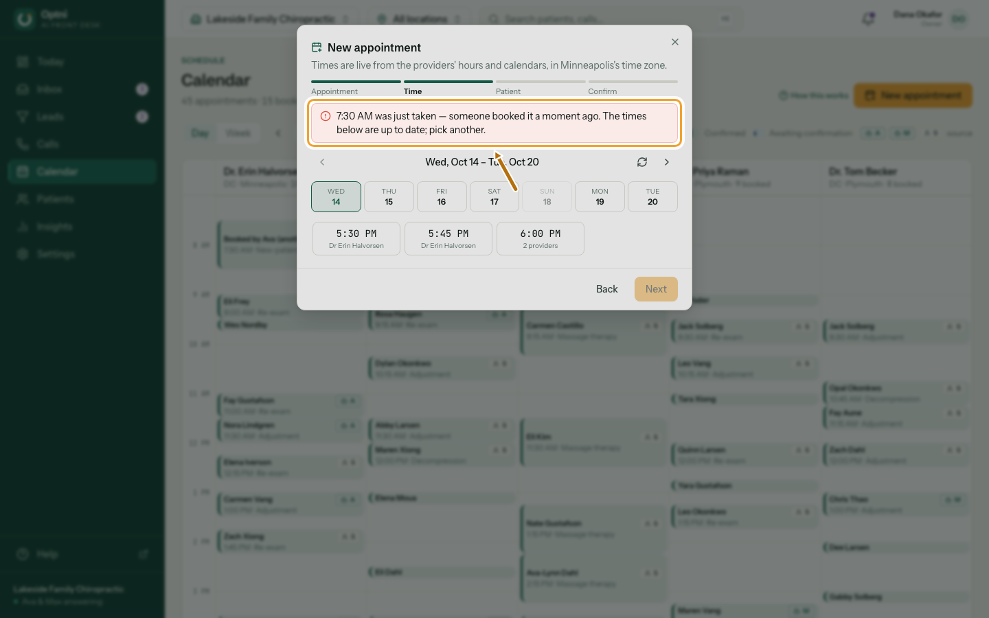 The booking dialog back on the time step, with a note that the chosen time was just taken.
